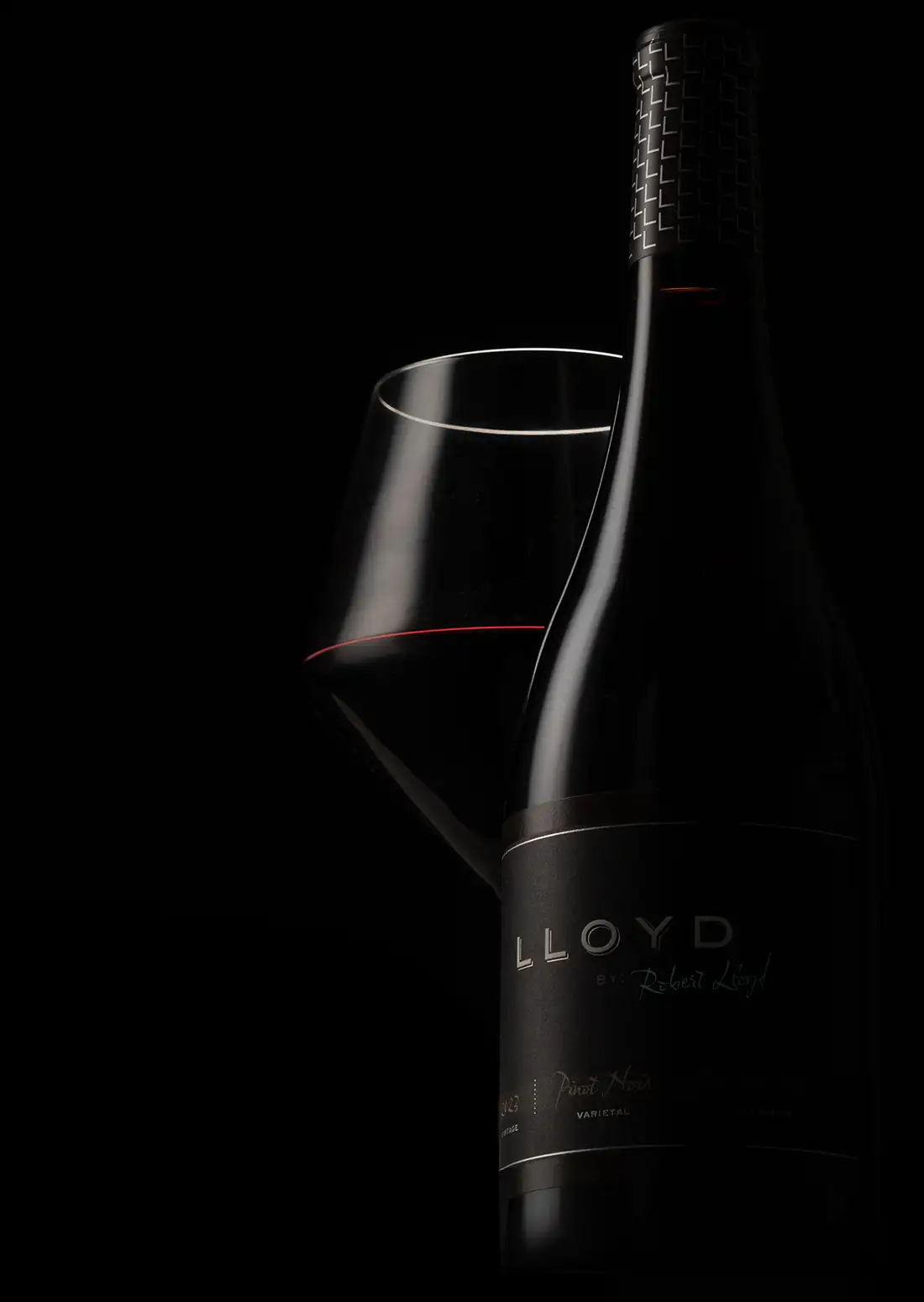 Lloyd By Robert Lloyd Pinot Noir wine and glass.