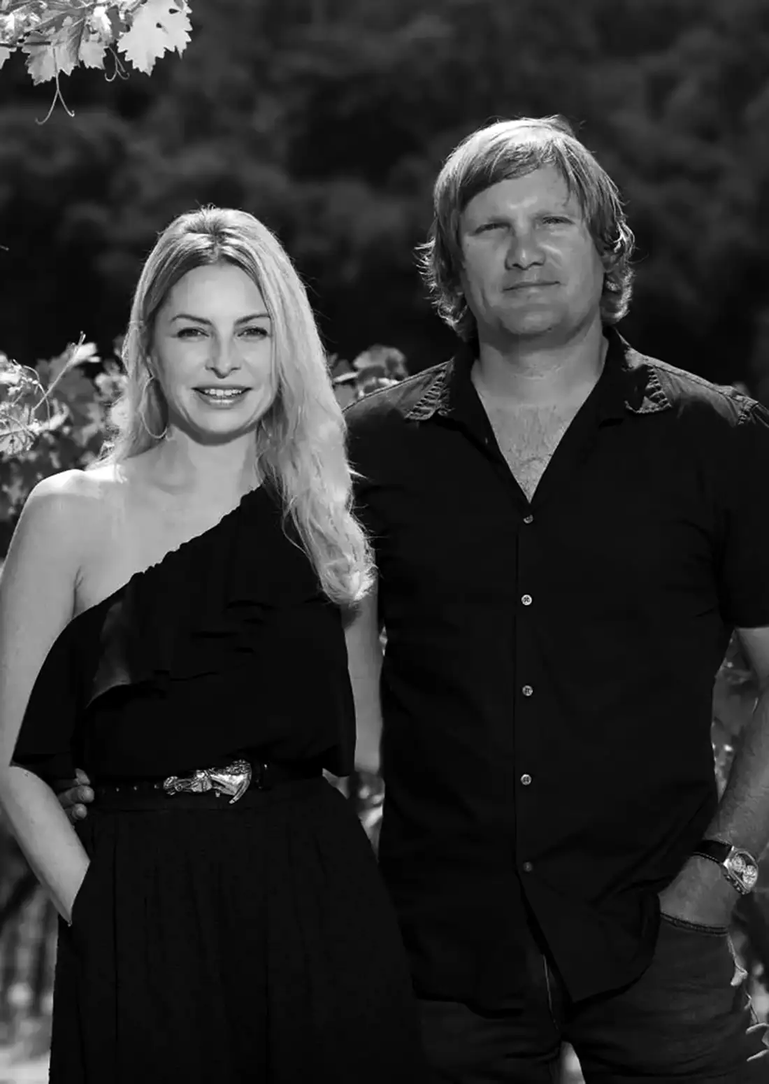 Robert and Bonnie Lloyd standing in a vineyard.