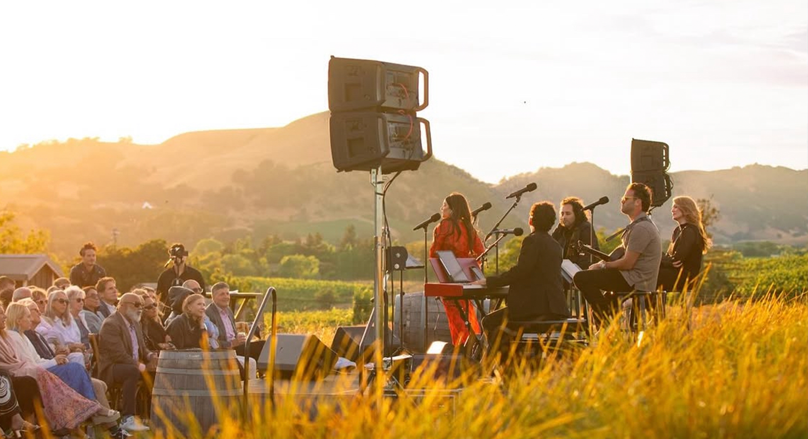 Photo of Alisan Porter and her band playing a concert outdoors at Carneros Resort for Broadway and Vine.