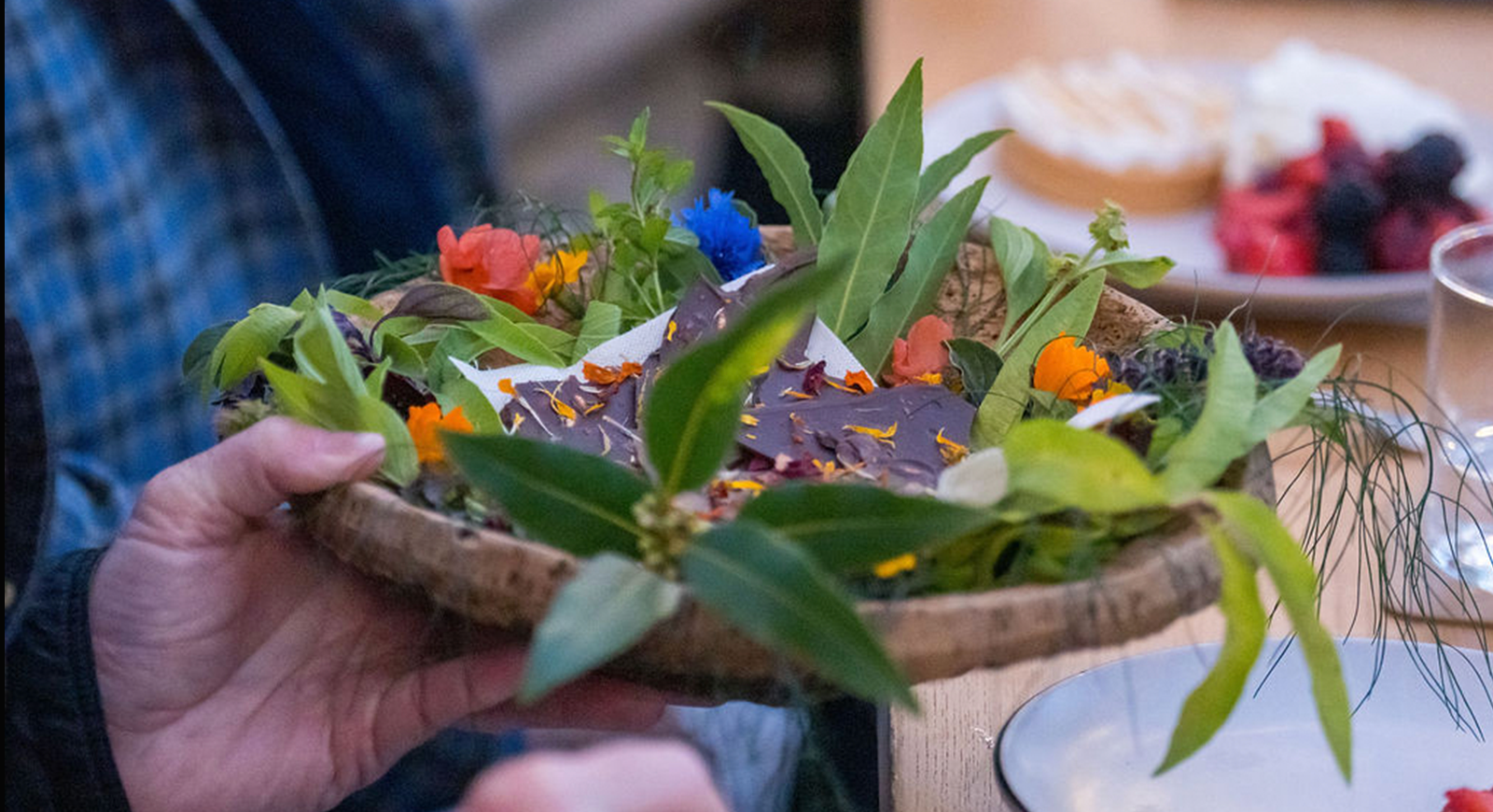 Photo of the second course, a delectable heirloom tomato salad.