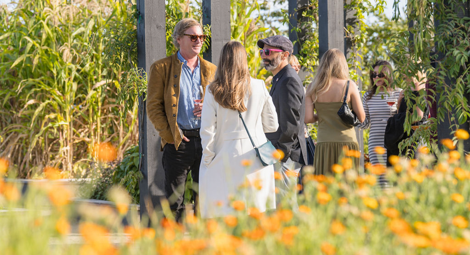 Winemaker Rob Lloyd talking with guests during the cocktail hour.