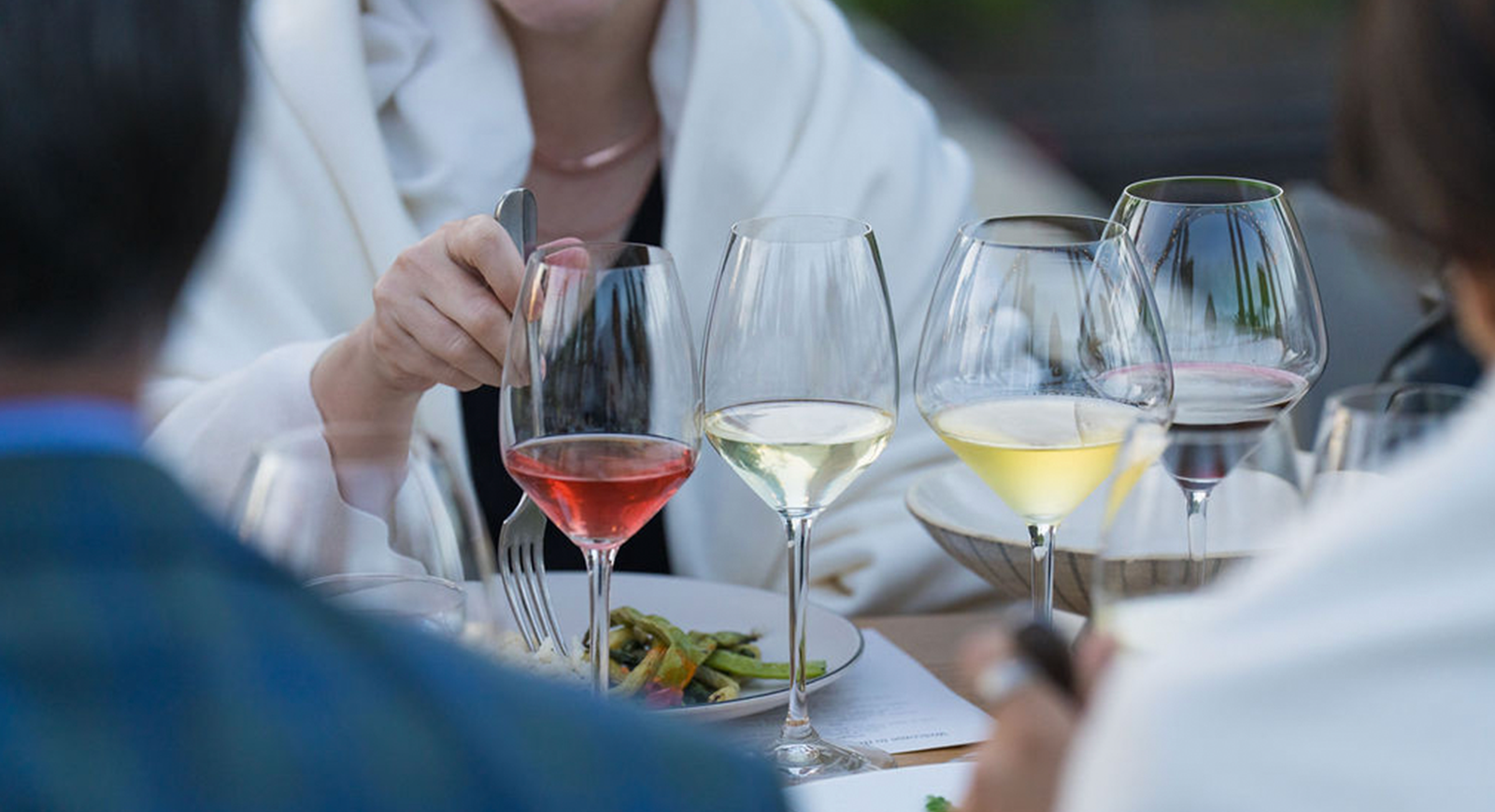 Photo of four glasses of our wine, a pinot noir, a rosé, a sauvignon blanc, and a chardonnay.